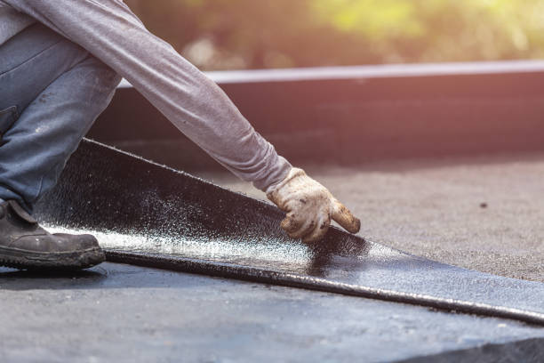 Professional Basement Waterproofing technician working in Farmersburg, IN